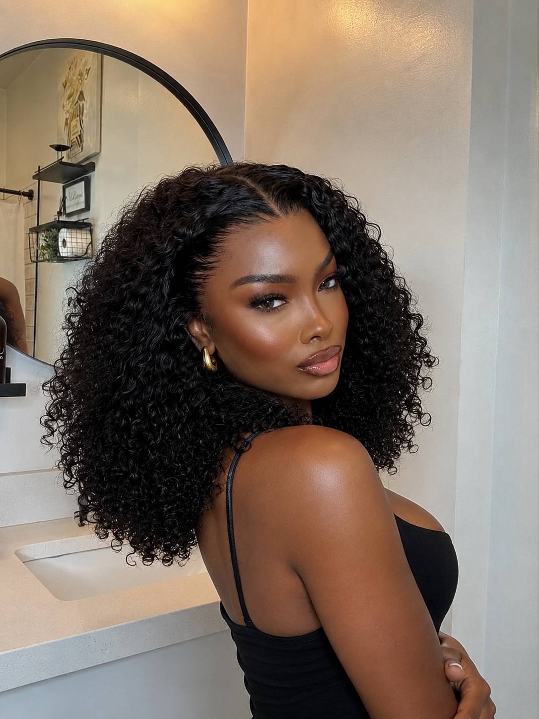 Perruque bouclée deep wave cheveux naturels lace HD birman BEL'HAIR Paris