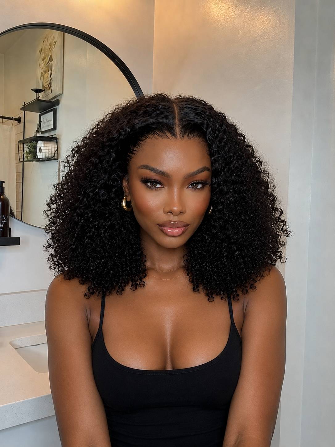 Perruque bouclée deep wave cheveux naturels lace HD birman BEL'HAIR Paris